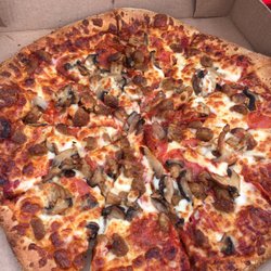 Gina's Pizza - Sausage, pepperoni and mushroom pizza