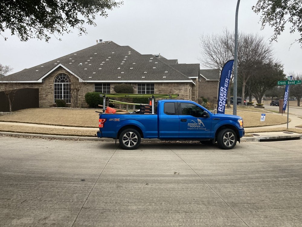 Slide of Roger The Roofer