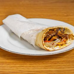 Hoolie's Grill - Fresh, flavorful, and packed with roasted veggies and crisp greens--this wrap is the ultimate wholesome bite!