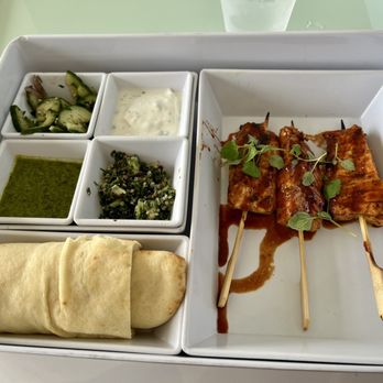 The Phoenician Spa - Salmon kabob with pita bread, yogurt, cucumber salad and salsa - Day Spas Near Me - Scottsdale, Arizona The Phoenician Spa - Salmon kabob with pita bread, yogurt, cucumber salad and salsa - Day Spas Near Me - Scottsdale, Arizona
