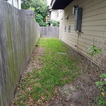 Morris Green Properties - at least they mowed, but left the trash from the previous tenant - Real Estate Services Near Me - Austin, Texas