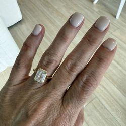 Trident Jewels & Time - A 4 Ct emerald cut natural diamond in a bezel cut setting.