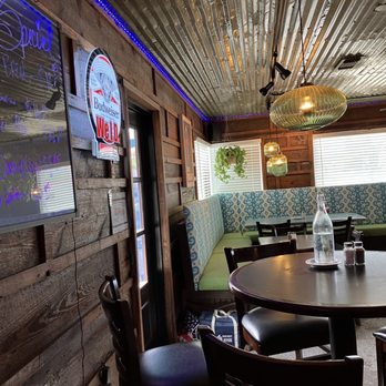 Scotty's Bistro & Pub - a table and chairs - Pubs Near Me - Coleman, Texas