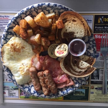 Rachel's Bakery and Cafe - My bf's plate with an extra portion of meat from my plate, and marble rye toast. He said the homemade breakfast sausages were awesome. - Bakeries Near Me - Lion's Head, Ontario