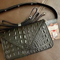 The Village Retail - Handbag company  Real leather
