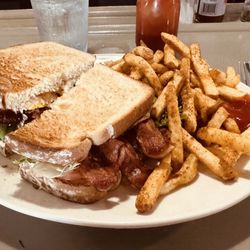East Shore Roadhouse - BELT sandwich with seasoned fries at East Shore Roadhouse