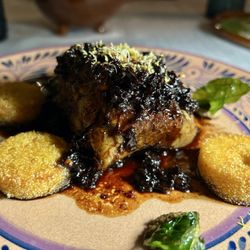 Agua - Braided short ribs with a blackberry rib sauce. Very good