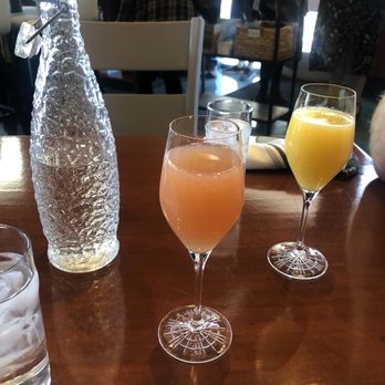 Full Belly - Mimosas orange juice and grapefruit - Breakfast & Brunch Near Me - San Antonio, Texas Full Belly - Mimosas orange juice and grapefruit - Breakfast & Brunch Near Me - San Antonio, Texas