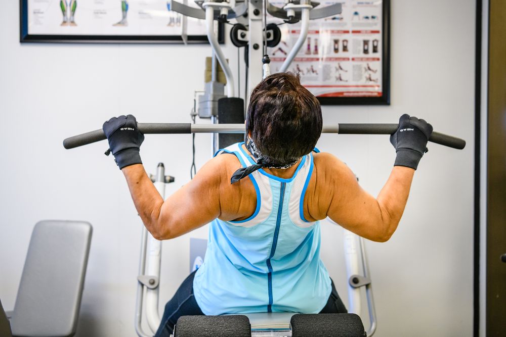 Gloria Kamil Total Fitness Transformation Logo