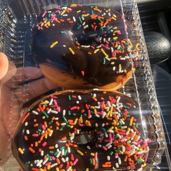Markellos Baking Company - two chocolate donuts with sprinkles - Bakeries Near Me - Chicago, Illinois Markellos Baking Company - two chocolate donuts with sprinkles - Bakeries Near Me - Chicago, Illinois