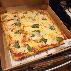Berardi Brothers Pizzeria - This is what a $25 pizza looks like. Not risen. They should have said they were out of dough.