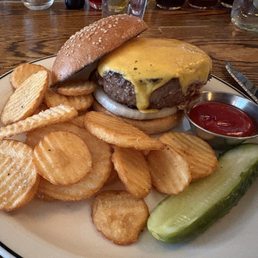 Dry aged burger cottage fries and onion with pickle Dry aged burger cottage fries and onion with pickle