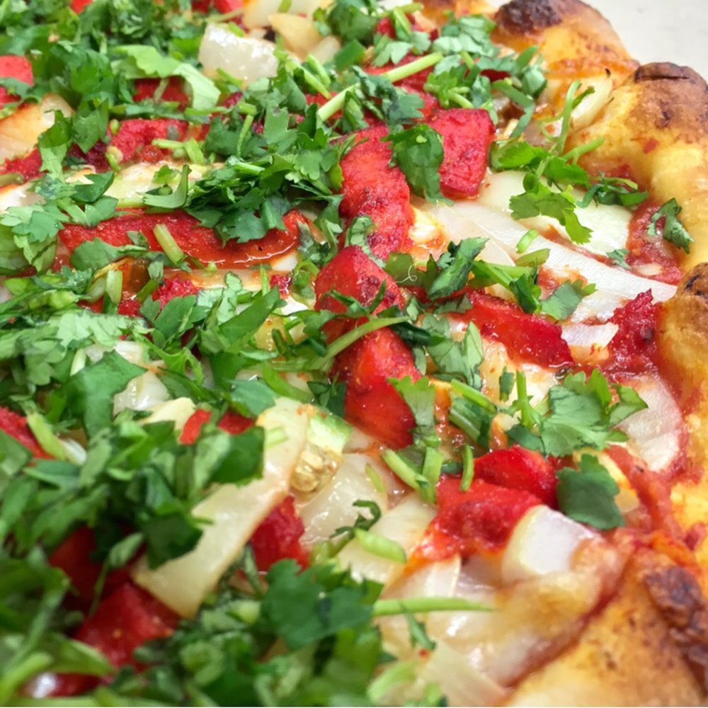 NYC Pizzeria - Punjabi Special Pizza with Tandoori Chicken, Ginger, Onion, Hot Peppers, Garlic, and Cilantro - N.Y.C. Pizzeria - Pizza Near Me - Vancouver, Washington