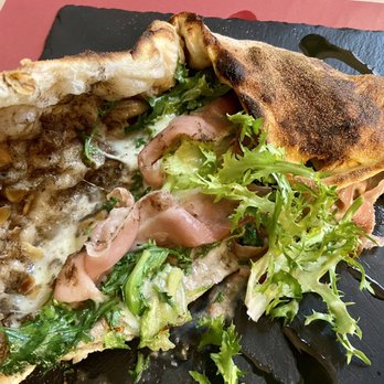 Schiticchio - Ficogrande "bundle" pizza with Sicilian truffle cream, Iblea mozzarella, endive, toasted Sicilian almonds, stracchino, speck, and olive oil - Pizza Near Me - Siracusa, SR