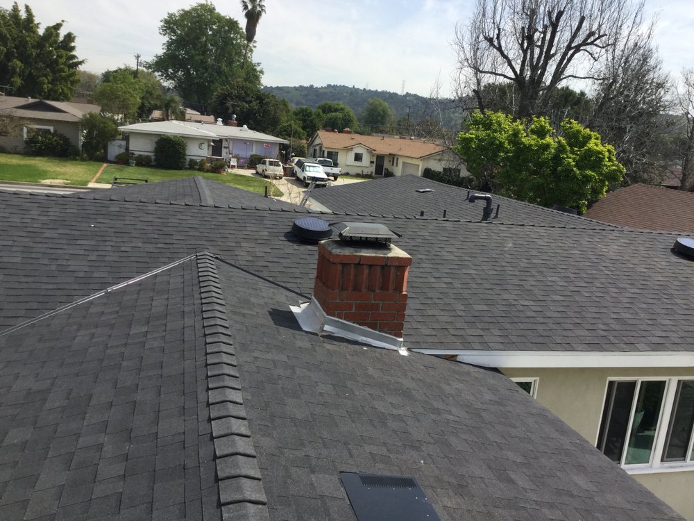 Slide of MA Roofing and Gutters