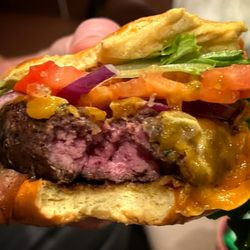 Tommy's Tavern + Tap - Cheeseburger, cooked to perfection.