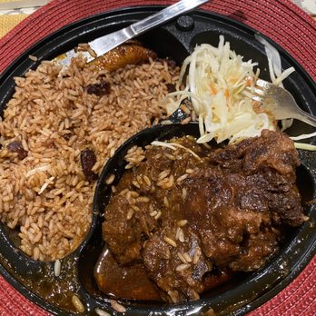 Erma's Island - Oxtails with rice and peas, sweet plantains, cole slaw - Caribbean Near Me - Syracuse, New York Erma's Island - Oxtails with rice and peas, sweet plantains, cole slaw - Caribbean Near Me - Syracuse, New York