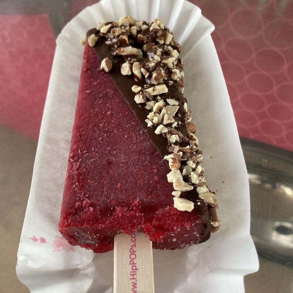 HipPOPs - Raspberry lychee sorbet with semi sweet chocolate and almonds - Ice Cream & Frozen Yogurt Near Me - Sheridan, Colorado HipPOPs - Raspberry lychee sorbet with semi sweet chocolate and almonds - Ice Cream & Frozen Yogurt Near Me - Sheridan, Colorado