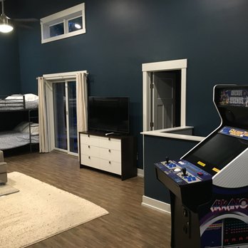 Luxe Haus Cabin Rental - 3rd King size bedroom and vintage arcade games including Golden Tee. - Vacation Rentals Near Me - Logan, Ohio Luxe Haus Cabin Rental - 3rd King size bedroom and vintage arcade games including Golden Tee. - Vacation Rentals Near Me - Logan, Ohio