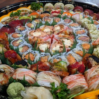 Yume Japanese Restaurant - We ordered a sushi party tray for $100. This included 6 regular rolls and 6 chef's choice rolls. - Japanese Near Me - Madison, Wisconsin Yume Japanese Restaurant - We ordered a sushi party tray for $100. This included 6 regular rolls and 6 chef's choice rolls. - Japanese Near Me - Madison, Wisconsin