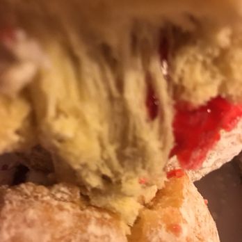 Donut Connection - a bite taken out of a donut - Bakeries Near Me - Charleston, West Virginia