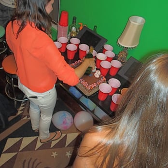 ITH San Diego Adventure Hostel - The lovely Jess, pouring champagne for the toast - Hostels Near Me - San Diego, California