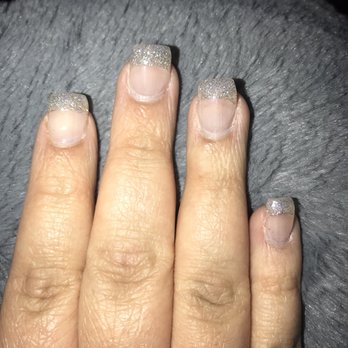 BJ's Happy Nail Spa - You can see lifting on the pinky, and the next finger over you can see it's going to the left a bit/going at an angle. - Nail Salons Near Me - Merced, California BJ's Happy Nail Spa - You can see lifting on the pinky, and the next finger over you can see it's going to the left a bit/going at an angle. - Nail Salons Near Me - Merced, California