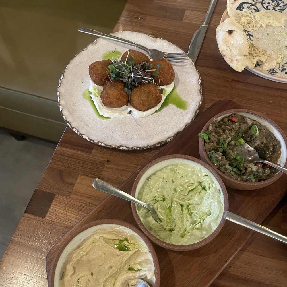 Yasemi, A Modern Mediterranean Restaurant - Dips and zucchini fritters - Mediterranean Near Me - Chicago, Illinois Yasemi, A Modern Mediterranean Restaurant - Dips and zucchini fritters - Mediterranean Near Me - Chicago, Illinois