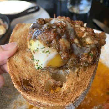 The Goldfinch - Baked Sicilian eggs on sourdough bread - New American Near Me - Irvine, California The Goldfinch - Baked Sicilian eggs on sourdough bread - New American Near Me - Irvine, California