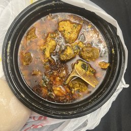 Spicy goat egusi and fufu Spicy goat egusi and fufu