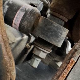 Holes in control arm