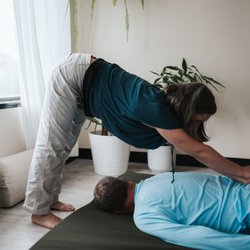 Downward dog for me, low back stretch for you.
