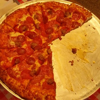 J.J.'s Pie Co. - Extra large all meat pizza with a few slices missing which we ate. - Pizza Near Me - Reno, Nevada J.J.'s Pie Co. - Extra large all meat pizza with a few slices missing which we ate. - Pizza Near Me - Reno, Nevada