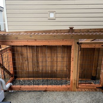 Craftsman Contracting - Full side view of off-the-porch dog run. Keeps dogs completely dry by going from covered porch to covered potty area. - General Contractors Near Me Craftsman Contracting - Full side view of off-the-porch dog run. Keeps dogs completely dry by going from covered porch to covered potty area. - General Contractors Near Me