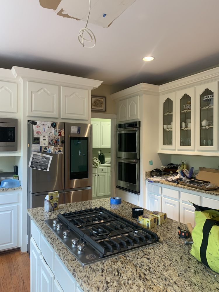 Slide of Ali Handyman