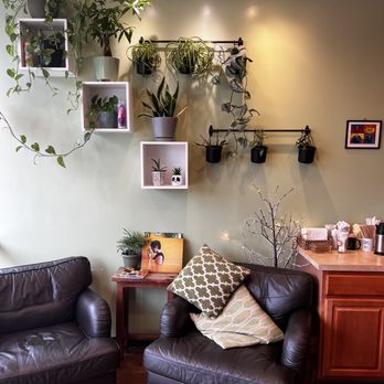 Mildfire Coffee Roasters - two leather chairs and a coffee table - Coffee & Tea Near Me - San Antonio, Texas