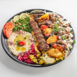 Habibi In Mediterranean Grill - Our combination Platter comes with Juicy Beef Kefta,Succulent Chicken Kebab, Flavorful Shish Kebab, Delightful Beef Shawarma