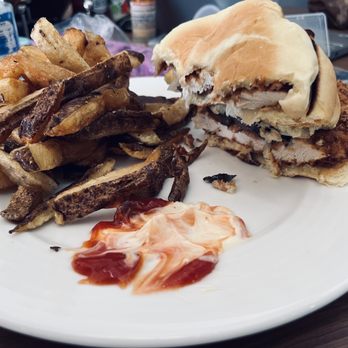 The Tap & Still - Spicy chicken sandwich with fresh cut fries - Dive Bars Near Me - Red Hook, Virgin Islands