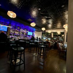 CZEN Restaurant Englewood - High top tables and bar area