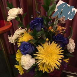 Blossom Shop - Pretty disappointed to find a small, wilted bouquet next to the urn from all the grandchildren. Particularly when we paid $110.