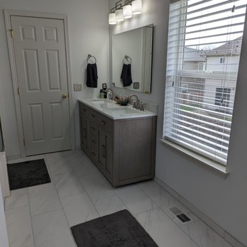 Prestige Stone - Installation of new tile, vanity, mirror, and lighting fixture, as well as paint. - Flooring Near Me