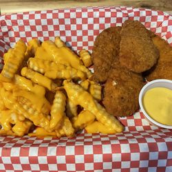 Lumber Yard Bar And Grill - Cheese fries and  Chicken Strips