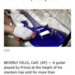 Julien's Auctions - Julien's Auction expected $200k, but actually sold for $563,500!! Prince's Blue Angel Cloud 2 guitar