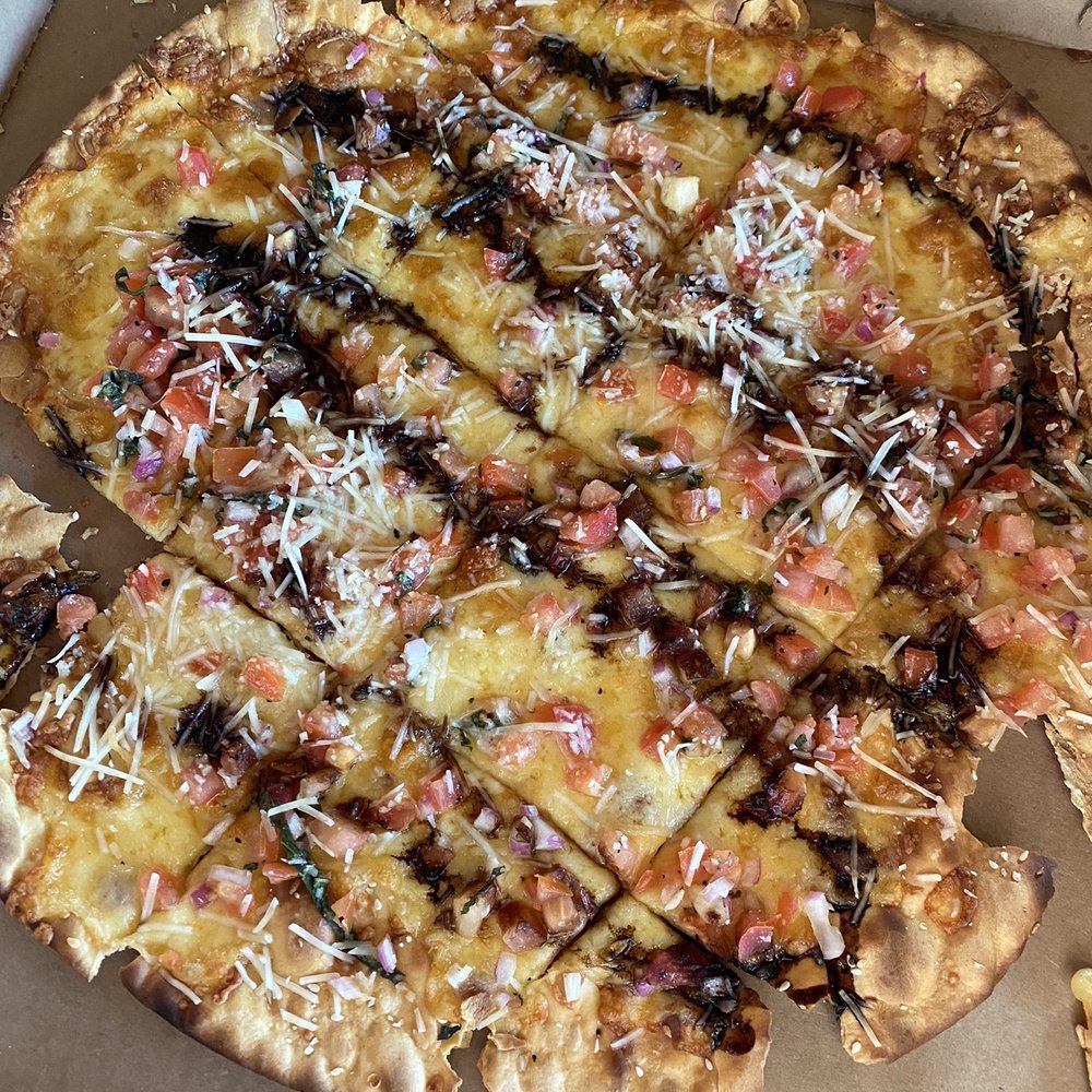 Ruttger's Lakeside Dining - Bruschetta Lavosh -- looks nothing like what they advertise and it didn't even have mozzarella chunks on it - American Near Me - Bemidji, Minnesota