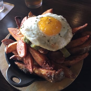 Bosscat Kitchen & Libations - Gravy fries with egg. - New American Near Me - Irvine, California Bosscat Kitchen & Libations - Gravy fries with egg. - New American Near Me - Irvine, California