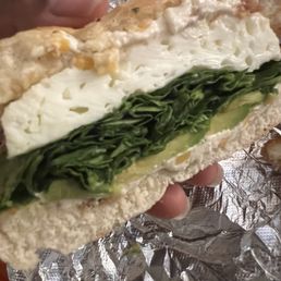 Plain bagel, bacon and cheddar cream cheese, sprouts, avocado, egg and spinach.