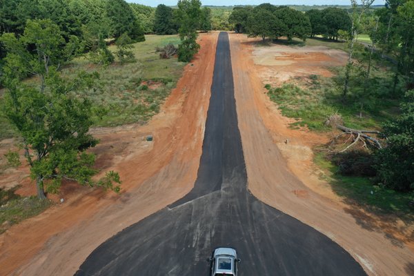 Residential and Commercial Driveways & Paving - At Craig's Dirt Service, we're a paving and driveway contractor who is equipped with a fleet of company-owned dump trucks and dirt pits. We always have supplies and equipment to get the job done.
We provide commercial and residential asphalt or concrete paving services to the Tyler and Lindale areas.
We only use the highest quality materials and methods to ensure your asphalt has been laid correctly. Our asphalt and concrete contractors are capable of providing you with the asphalt drive for your home, access road, or any other residential or commercial asphalt needs.
Do you need to redo or install a driveway or parking lot?
Craig's Dirt Service can help. Our team can handle residential and commercial driveways - from large to small. The shear strength of our driveways will provide you with access for years to come. We have you covered.
Our Services Include
Concrete parking lots
Asphalt driveways
Gravel driveways and roads
And more
Driveway Materials We Offer
Crushed Concrete
Recycled Asphalt (millings)
Base Rock Residential and Commercial Driveways & Paving - At Craig's Dirt Service, we're a paving and driveway contractor who is equipped with a fleet of company-owned dump trucks and dirt pits. We always have supplies and equipment to get the job done.
We provide commercial and residential asphalt or concrete paving services to the Tyler and Lindale areas.
We only use the highest quality materials and methods to ensure your asphalt has been laid correctly. Our asphalt and concrete contractors are capable of providing you with the asphalt drive for your home, access road, or any other residential or commercial asphalt needs.
Do you need to redo or install a driveway or parking lot?
Craig's Dirt Service can help. Our team can handle residential and commercial driveways - from large to small. The shear strength of our driveways will provide you with access for years to come. We have you covered.
Our Services Include
Concrete parking lots
Asphalt driveways
Gravel driveways and roads
And more
Driveway Materials We Offer
Crushed Concrete
Recycled Asphalt (millings)
Base Rock
