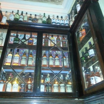 Palace Bar - The whiskey shelves in the upstairs bar (this time taken with flash) - Pubs Near Me - Dublin, D Palace Bar - The whiskey shelves in the upstairs bar (this time taken with flash) - Pubs Near Me - Dublin, D