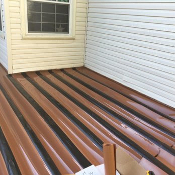 American Restoration Service - a deck with corrugated siding - General Contractors Near Me - Lorton, Virginia American Restoration Service - a deck with corrugated siding - General Contractors Near Me - Lorton, Virginia