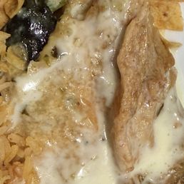 Poblano Relleno with spinach and chicken, queso on top. Poblano Relleno with spinach and chicken, queso on top.